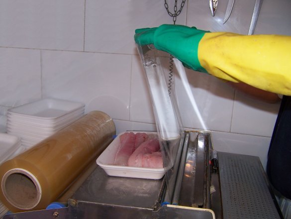 Servicio de limpieza y envasado del pescado